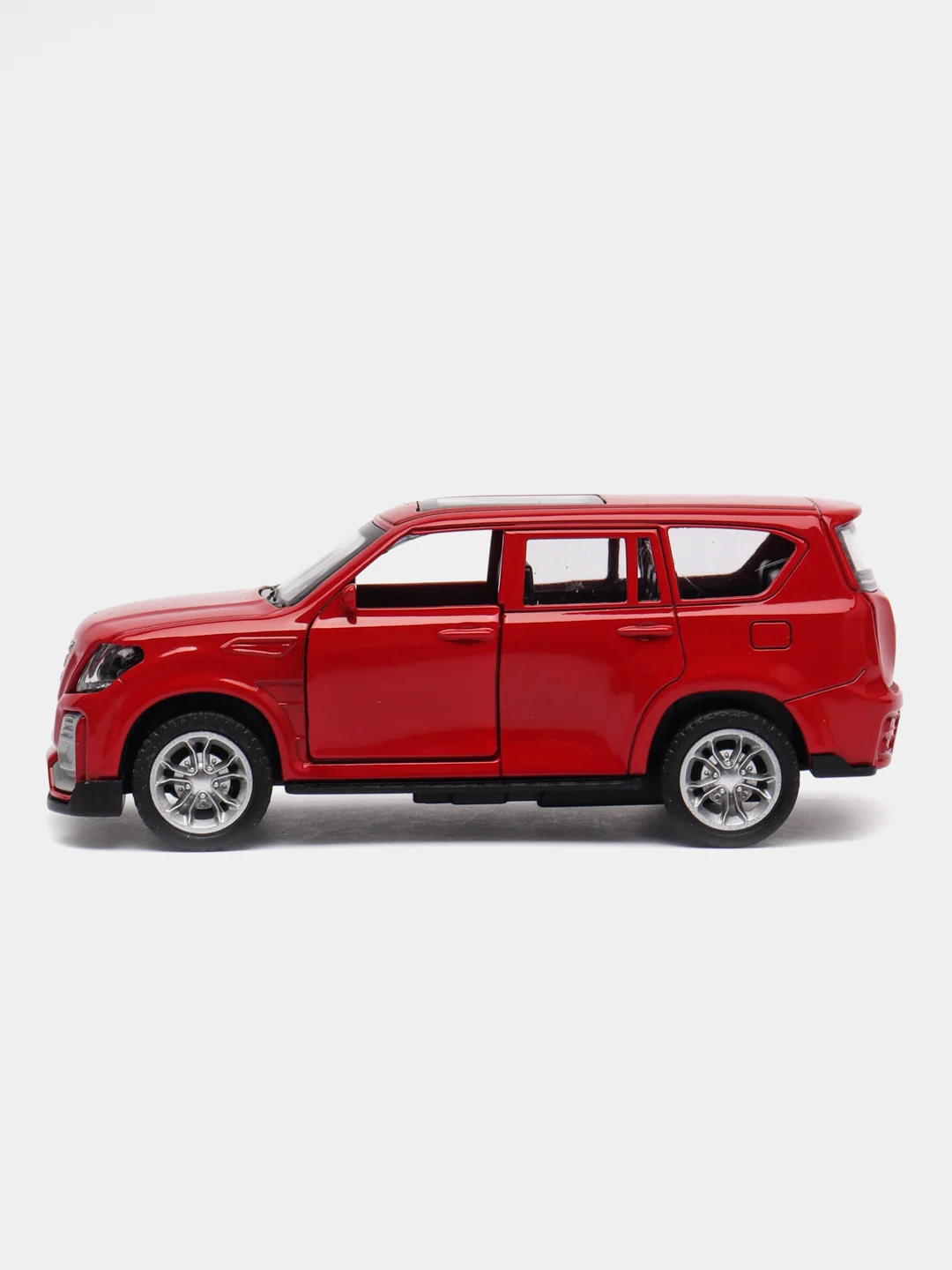 Красный металлическая коллекционная машинка Nissan Raptor