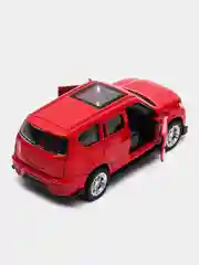 Красный металлическая коллекционная машинка Nissan Raptor