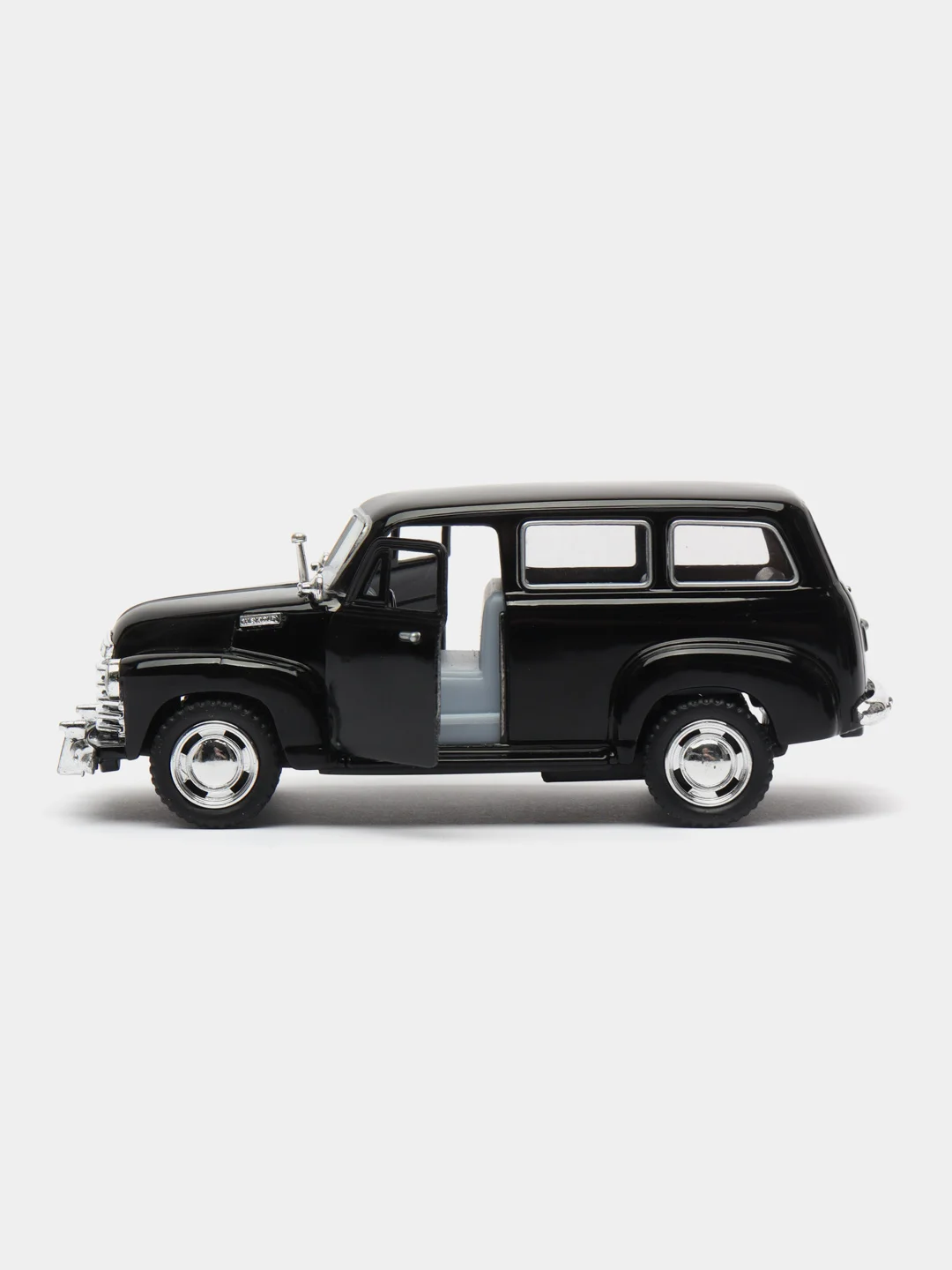 Синий металлическая машинка Kinsmart 1950 Chevrolet Suburban Carryall, 1:36, KT5006D