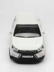 Белый металлическая коллекционная машинка LADA Vesta Cross