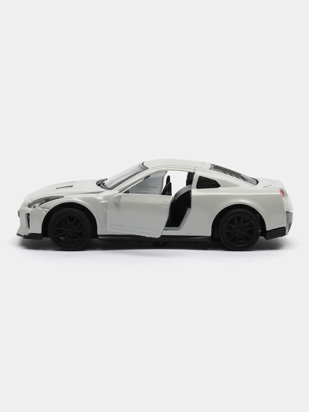 Белый металлическая коллекционная машинка Nissan GT-R