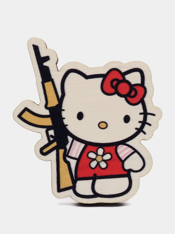 Значок Kitti с автоматом