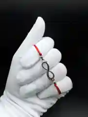 Браслет красная нить бесконечность