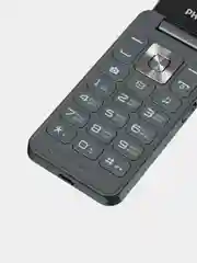 Серый мобильный телефон Philips Xenium E2602