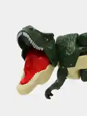 Зеленый игрушка динозавр, преображающийся, колеблющийся