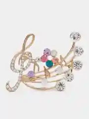 Брошь "Скрипичный ключ с ресничками"
