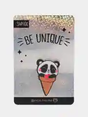 Значок на открытке "Be unique"