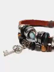 Кожаный плетеный браслет "Ключик"
