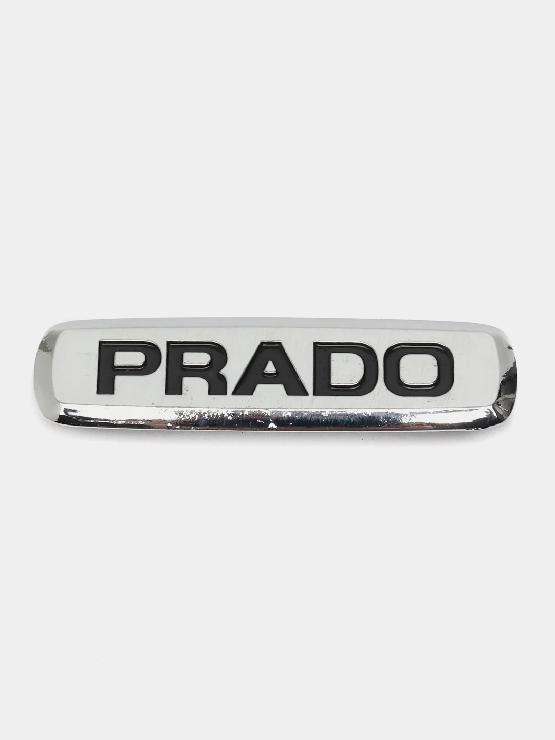Шильдик логотип на автоковрик Prado