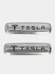 Шильдик логотип на автоковрик Tesla