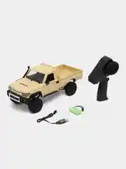 Желтый радиоуправляемая полноприводная машина с пультом ДУ Toyota MN82, масштаб 1:12