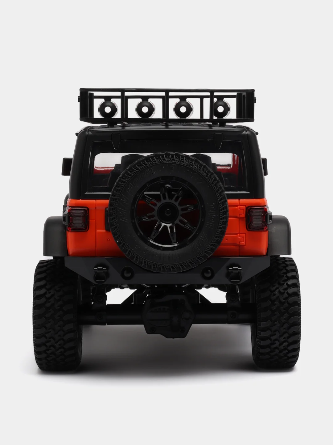 Оранжевый радиоуправляемая полноприводная машина с пультом ДУ Jeep MN128, большой масштаб 1:12