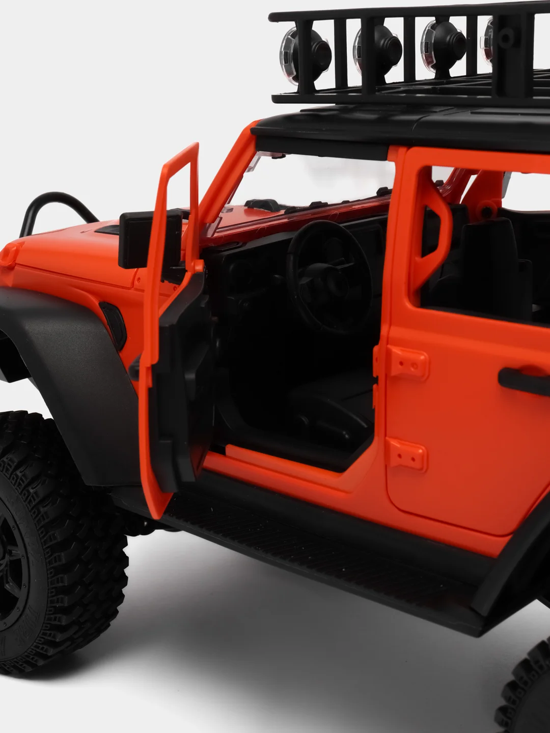Оранжевый радиоуправляемая полноприводная машина с пультом ДУ Jeep MN128, большой масштаб 1:12