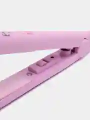 Розовый выпрямитель для волос