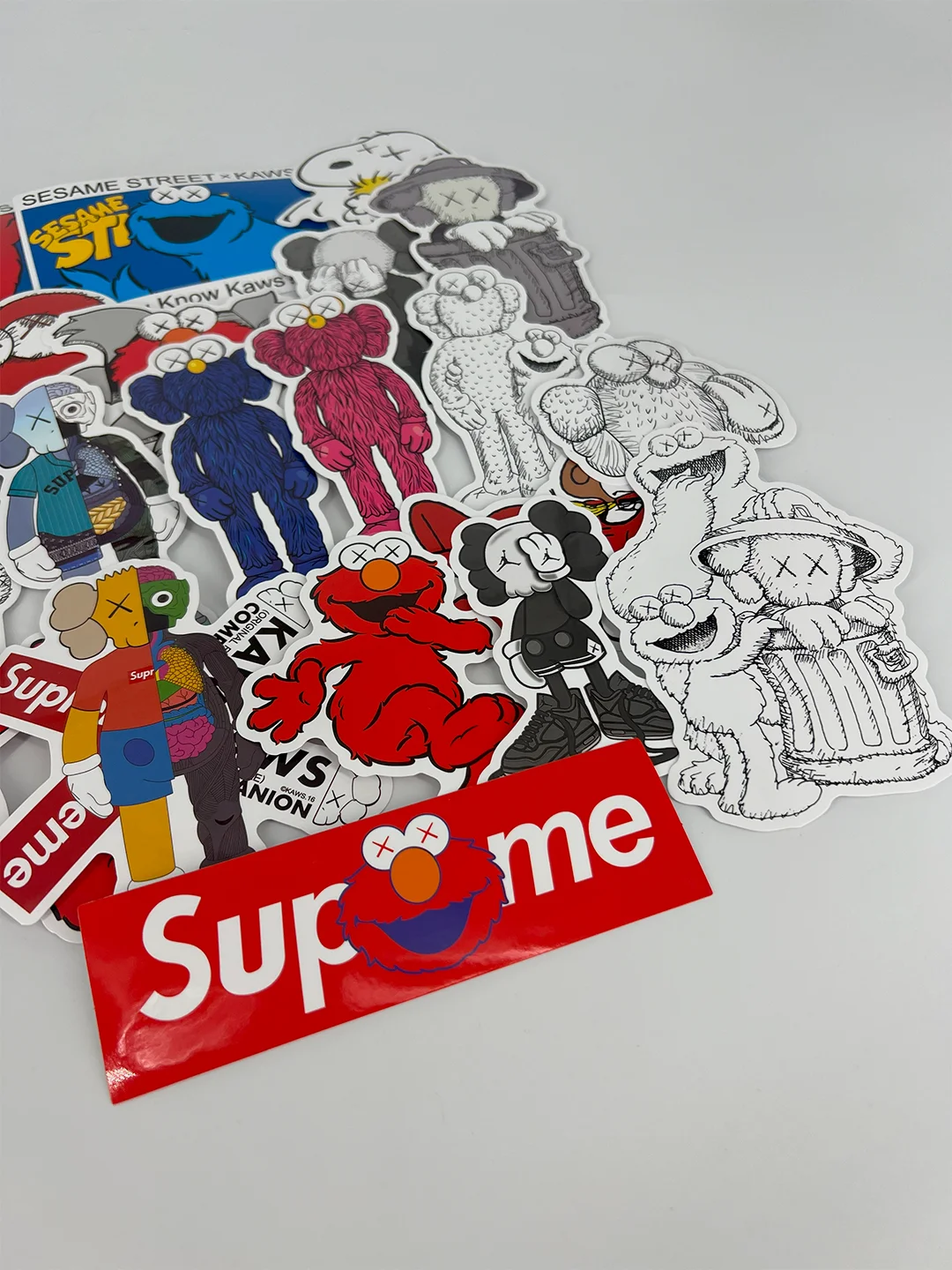 Стикеры наклейки "KAWS", 23 штуки