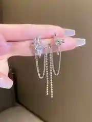Женские серьги из двух звёзд с цепочкой