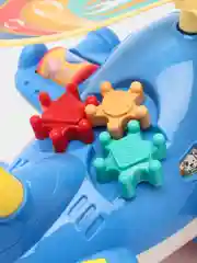 Красный игрушка-каталка для малышей с ручкой