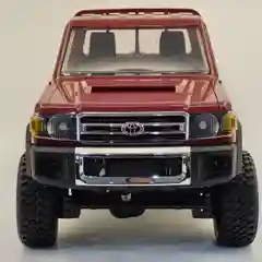 Желтый радиоуправляемая полноприводная машина с пультом ДУ Toyota MN82, масштаб 1:12