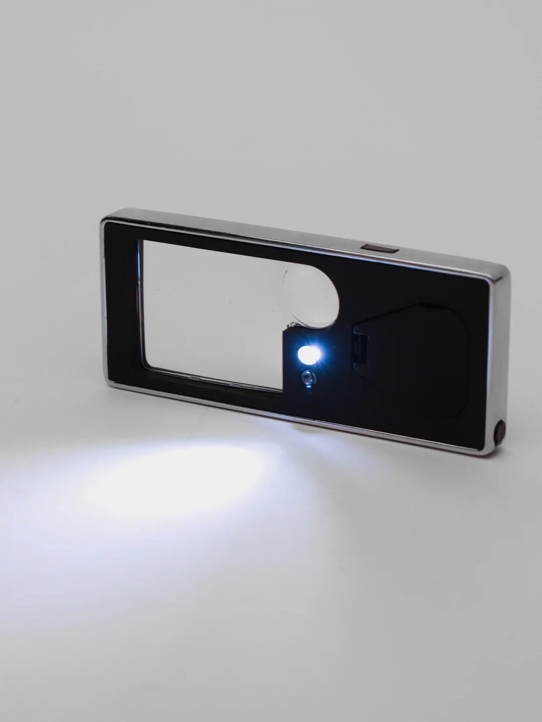 Лупа карманная 3/10x для чтения с подсветкой + ультрафиолет (5 LED) черная