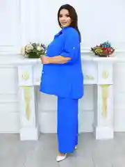 Зеленый костюм женский размеры 54-60