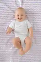 Клеёнка-наматрасник  "Сиреневые зигзаги" от ROXY-KIDS