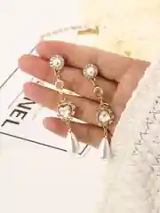 Женские серьги - подвески с жемчужными каплями