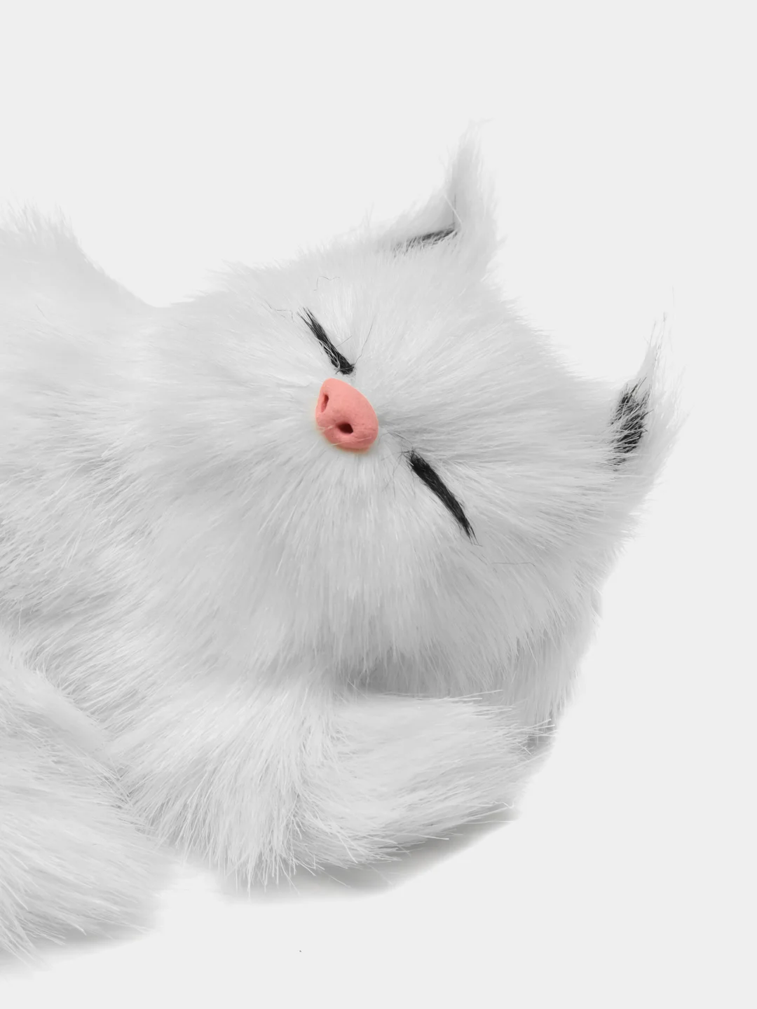 Белый статуэтка котенка спящего