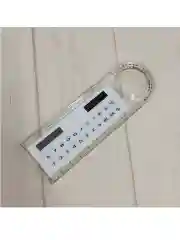 Белый линейка с калькулятором
