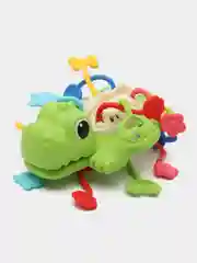 Зеленый развивающая игрушка с тактильными резиночками/бизиборд/тянучка/погремушка-прорезыватель