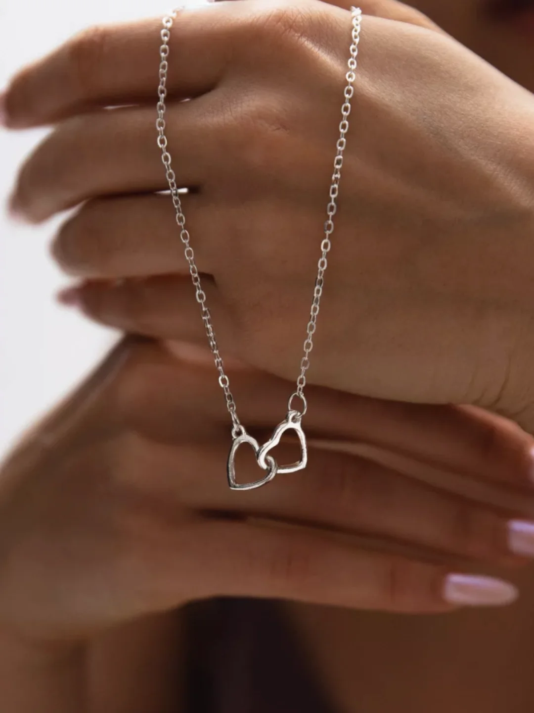 Серебряный цепочка на шею "Два сердца"