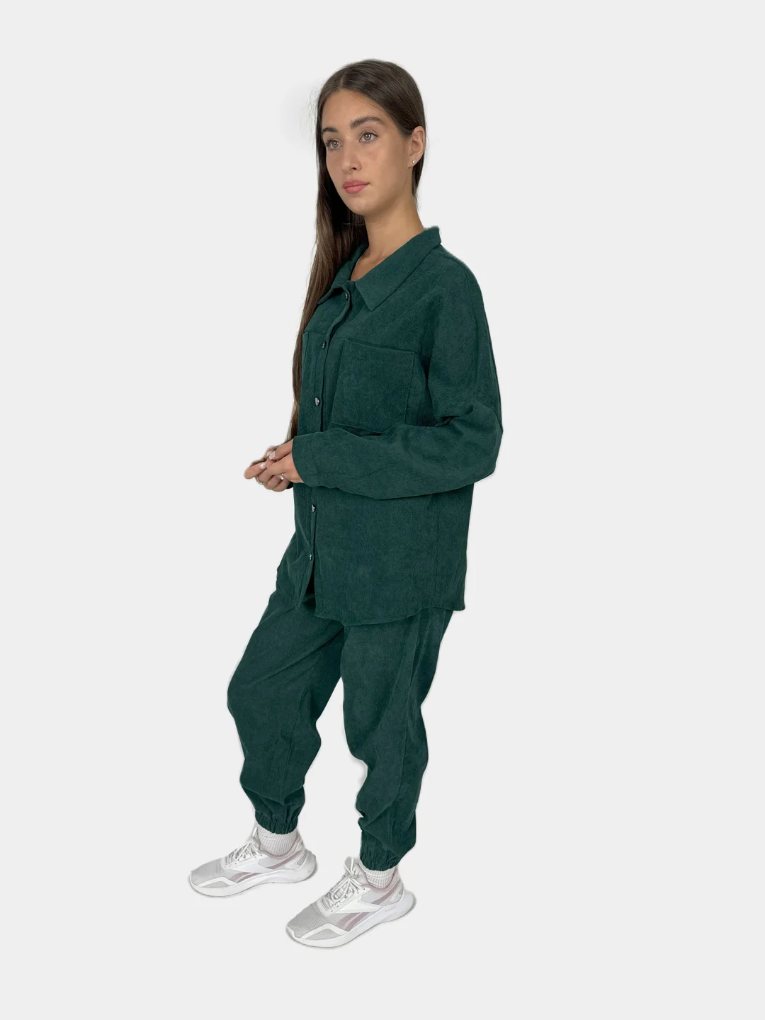Зеленый костюм женский