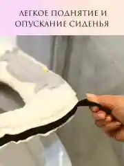 Розовый мягкий чехол на сиденье унитаза