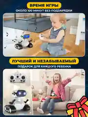 Белый игрушка робот на пульте управления