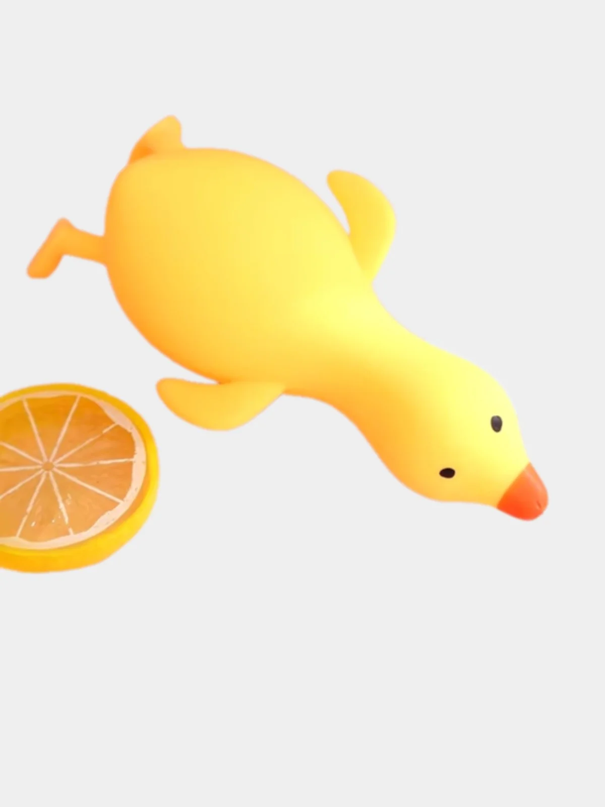 Желтый игрушка антистресс гусь, сквиш, тянучка, 16 см