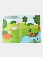 Голубой книга с наклейками-кружочками "Синий трактор"