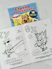 Книга Азбука с наклейками Три кота Карамелька Стикеры Мульт