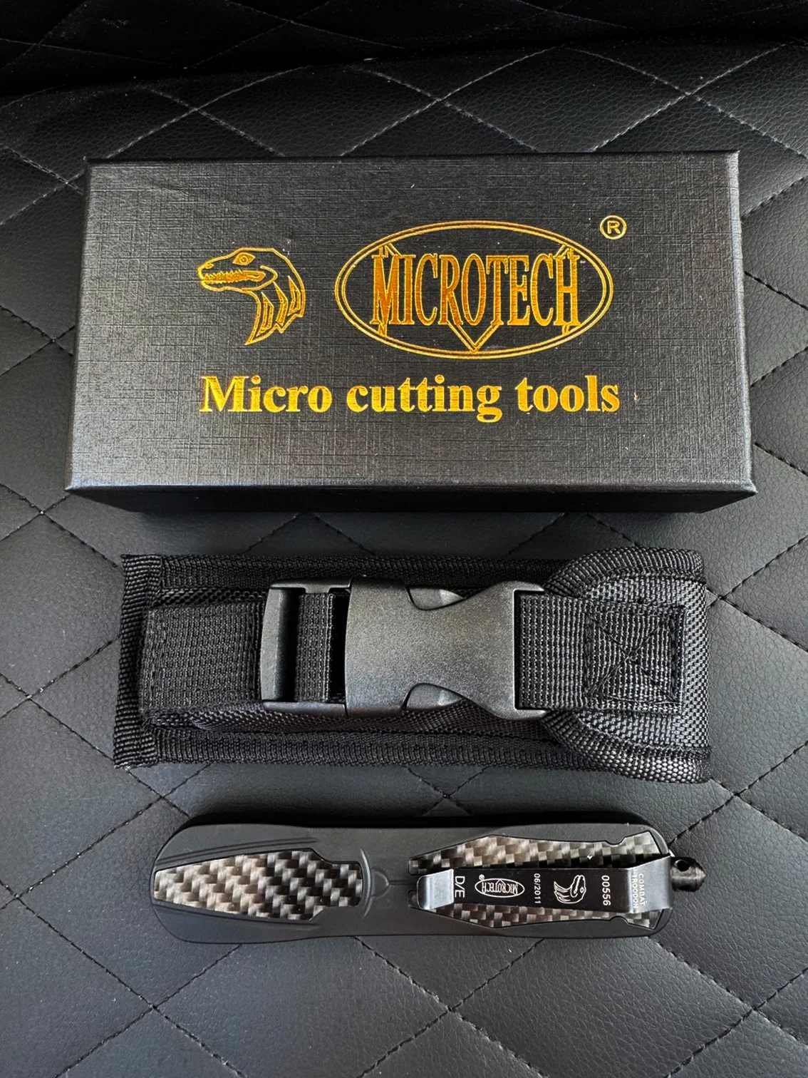 Складной нож Microtech с двусторонней заточкой, фронтально-выкидной, автоматический